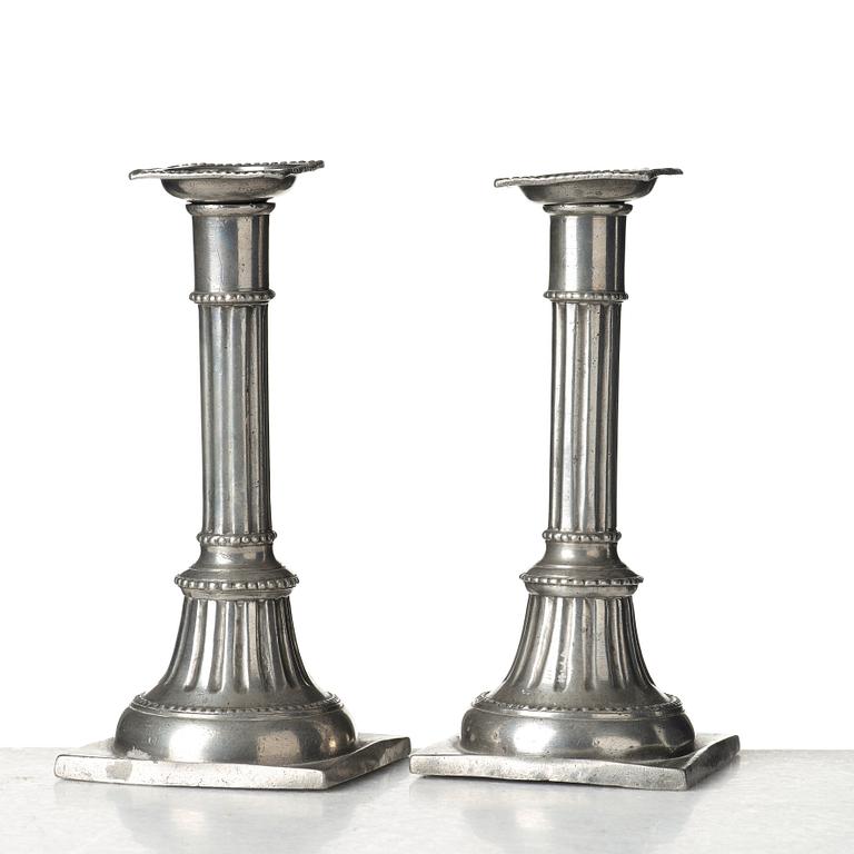 A pair of late Gustavian pewter candelsticks by Daniel Rising, Åbo 1797.