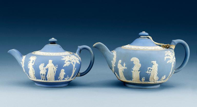 Two English jasper ware teapots with covers, Wedgwood. (2).