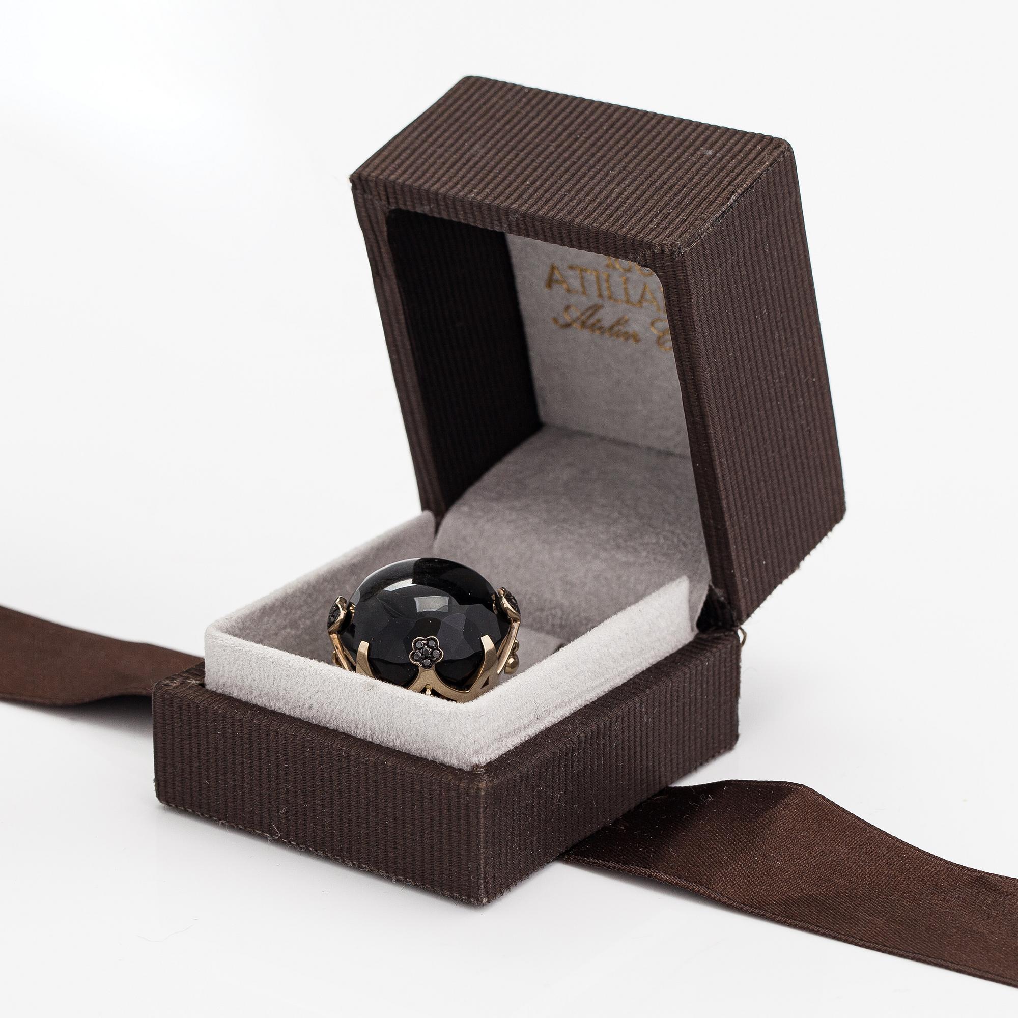 Pasquale Bruni, an 18K gold pendant with black diamonds ca. 0.60 ct in total and a obsidian.