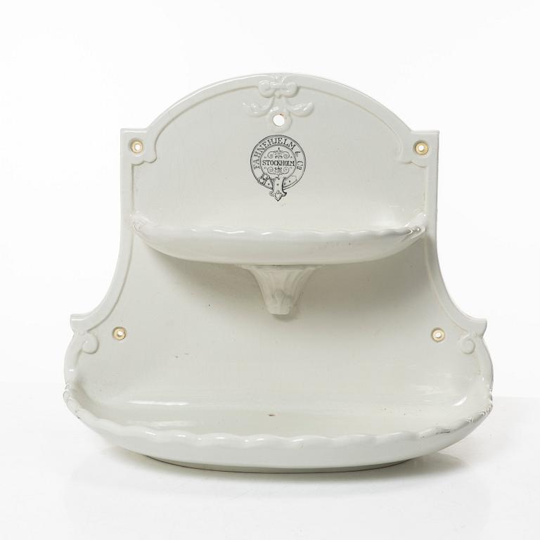 A bathroom shelf, porcelain, Fahnehjelm & Co., early 20th century.