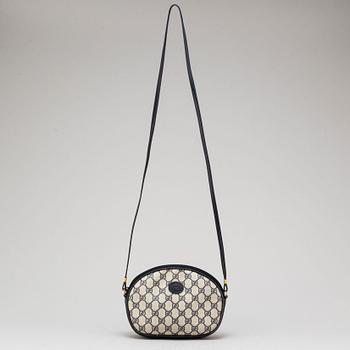 a 1980's Gucci bag and purse.