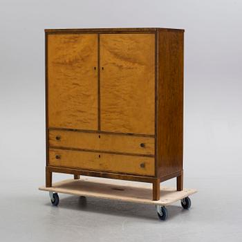 A Swedish Modern birch veneered cabinet, 1930's.