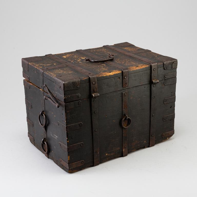 A wooden box, dated 1743.