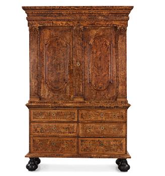 3. A Swedish late Baroque burr-alder cabinet, Stockholm, first part 18th century.