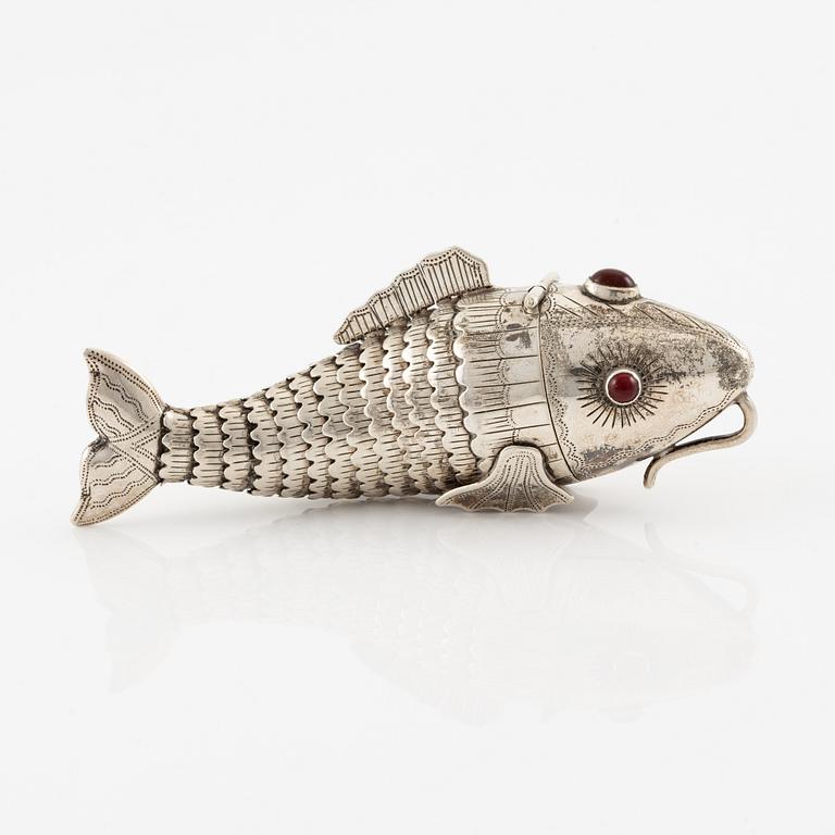 Pendant in the form of a fish, silver with red stones.