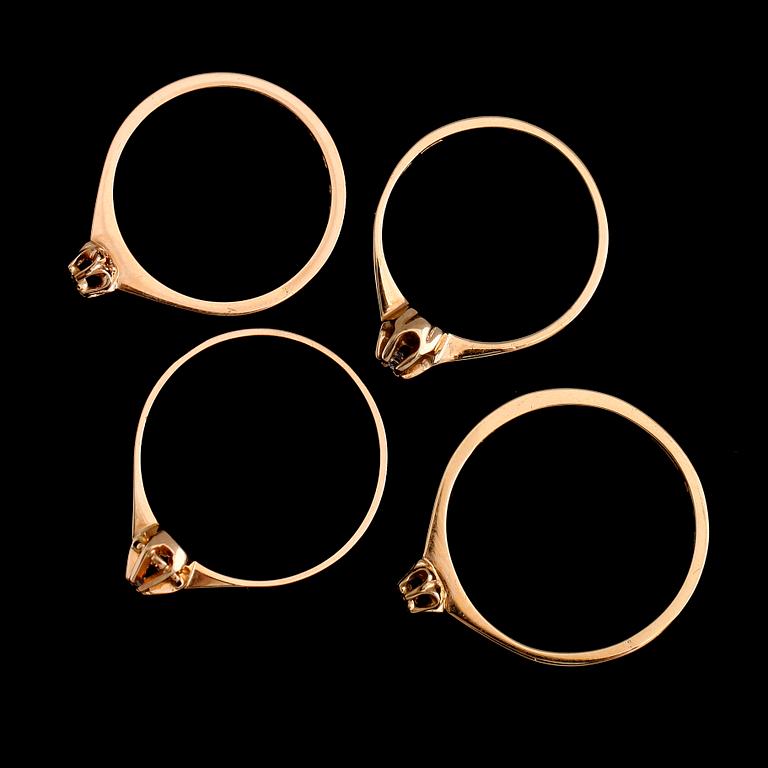 RINGAR, 4 st, 18 k guld med briljantslipade diamanter, 1900-talets andra hälft. Vikt ca 4 gram.
