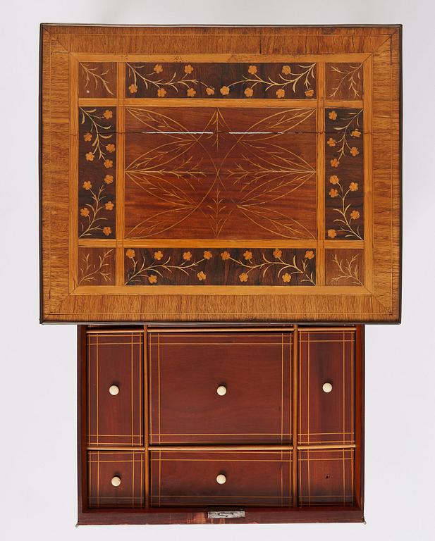 A late Gustavian marquetry table, attributed to J Westring, around year 1800.