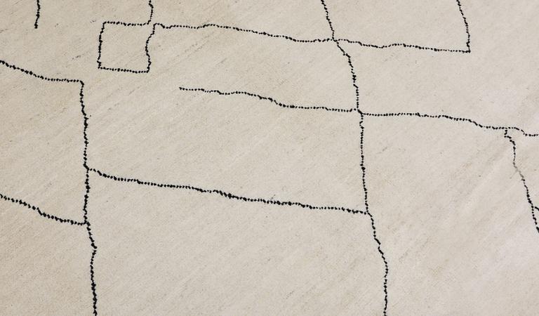 A Moroccan carpet, approx. 303 x 202 cm.