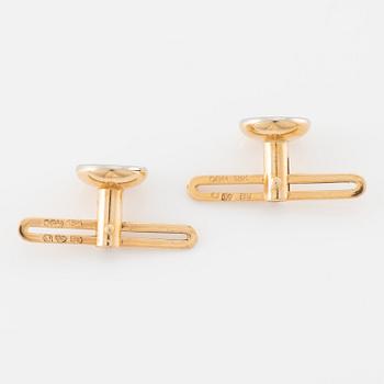 C.G Hallberg, cufflinks and shirt studs, two pairs, 18K gold with diamonds and mother-of-pearl.