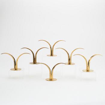 Ivar Ålenius-Björk, a set of six 'Liljan' candlesticks from Ystad Metall, mid 20th Century.