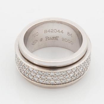 A Piaget "Possesion" ring in 18K white gold set with round brilliant-cut diamonds.