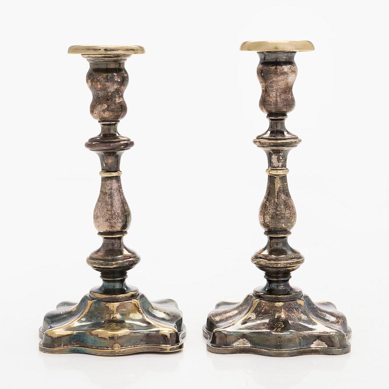 A pair of Fraget silver-plated candelsticks, Warsaw 1851-59.