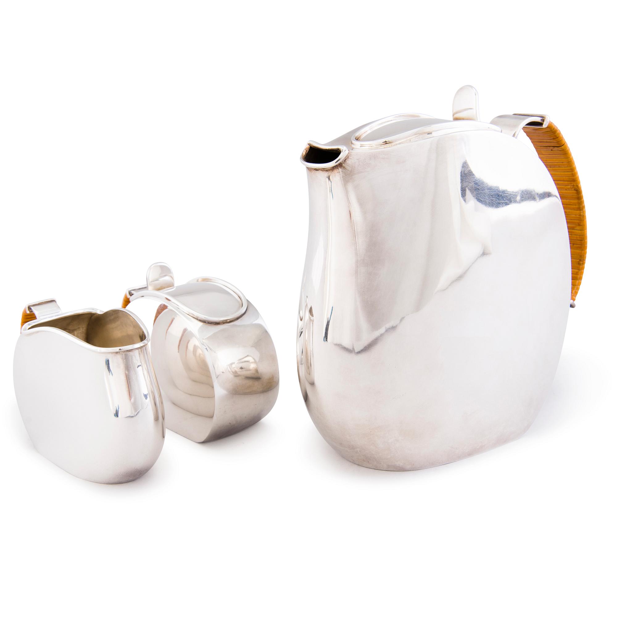 A THREE-PIECE SILVER COFFEE SET, Anita Sarlin, Koruteollisuus Tillander Oy, Helsinki 1951.
