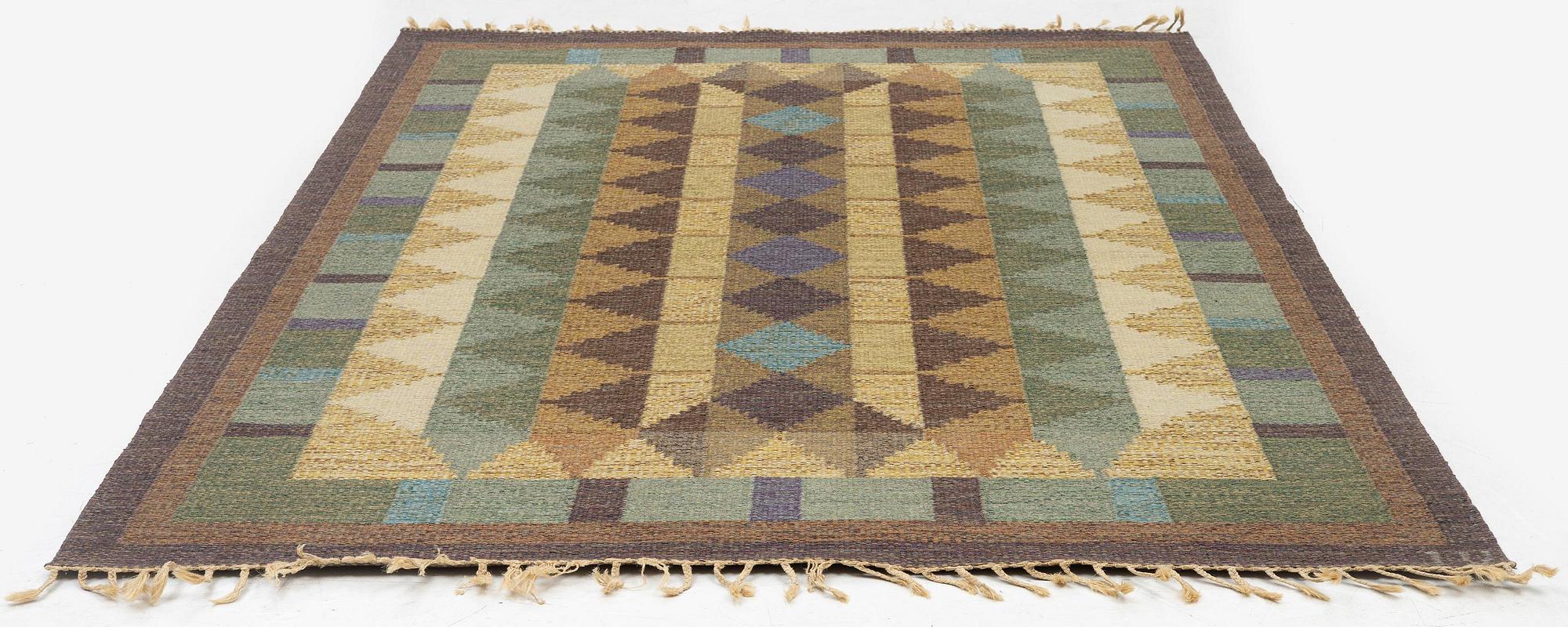 Inga-Mi Varneus Rydgren, a carpet, flat weave, c. 246 x 169 cm, signed IV.