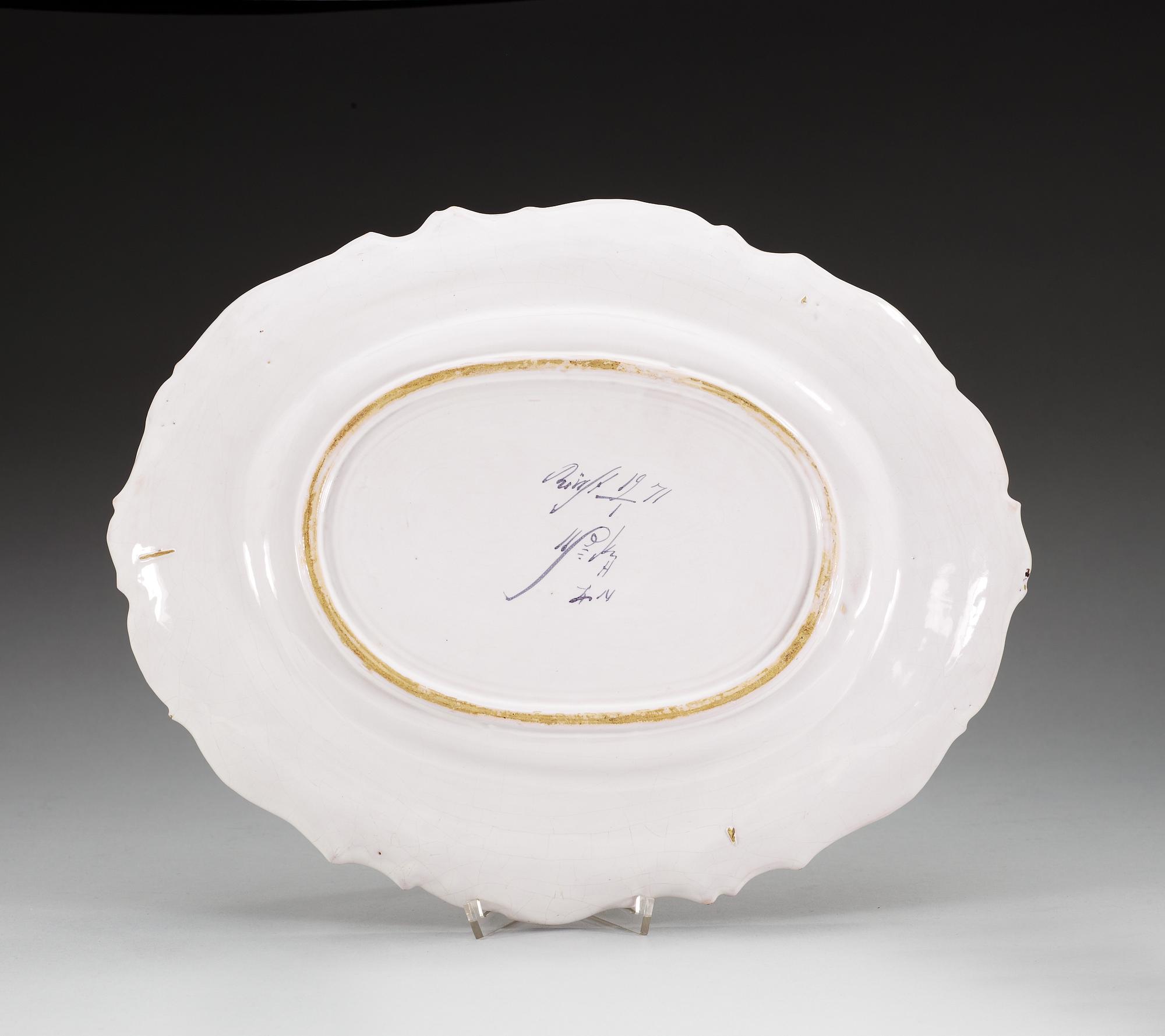 A Swedish Rörstrand serving dish dated 19/1 (17)71.