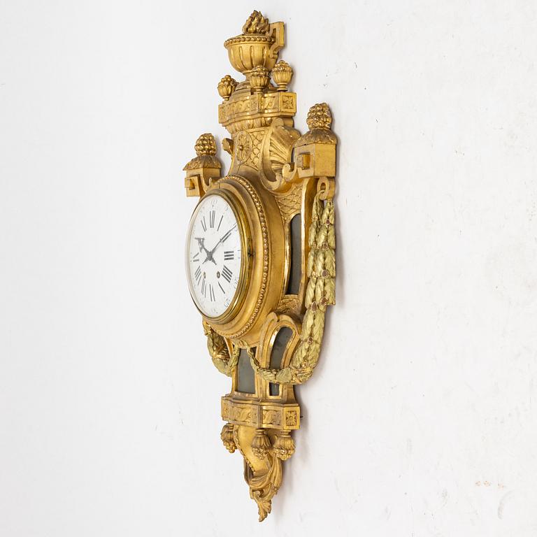 A Gustavian style wall clock, 20th century, signed A.Lundmark.