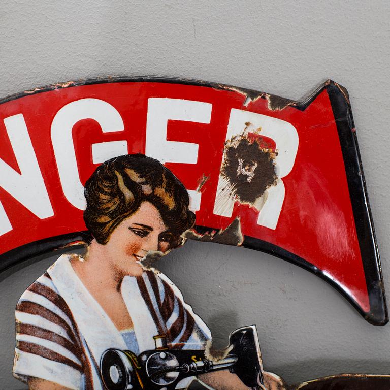 an enamel sign, Singer, from the 1920's.