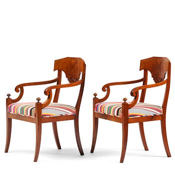 214. A pair of Swedish Empire armchairs,