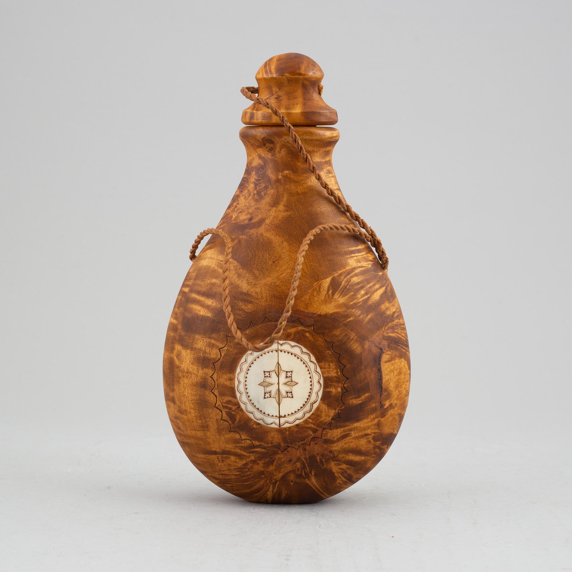 Anders Sunna, a Sami birch and reindeer horn salt flask, signed A. Sunna.