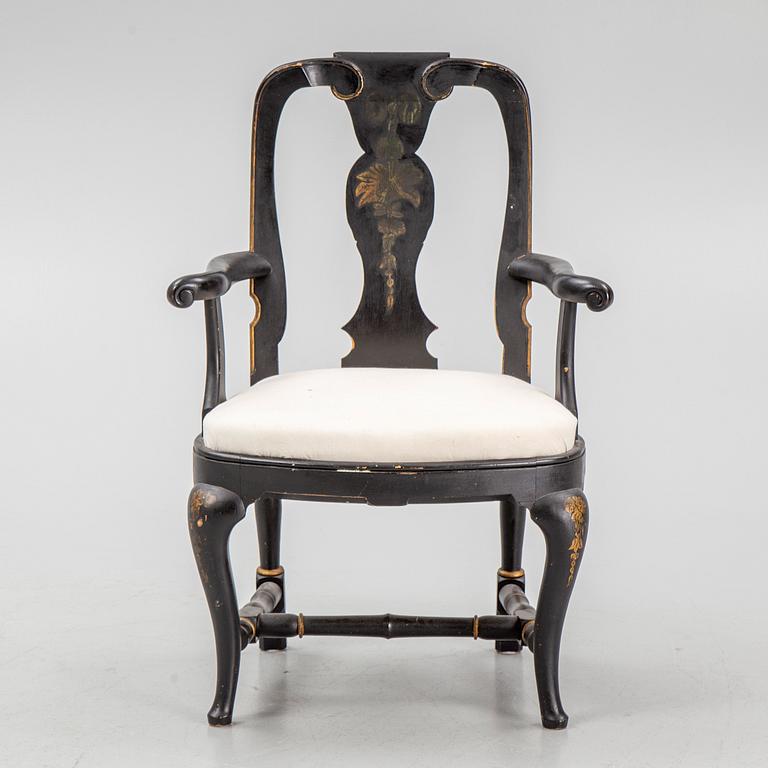 A rococo style armchair, around 1900.