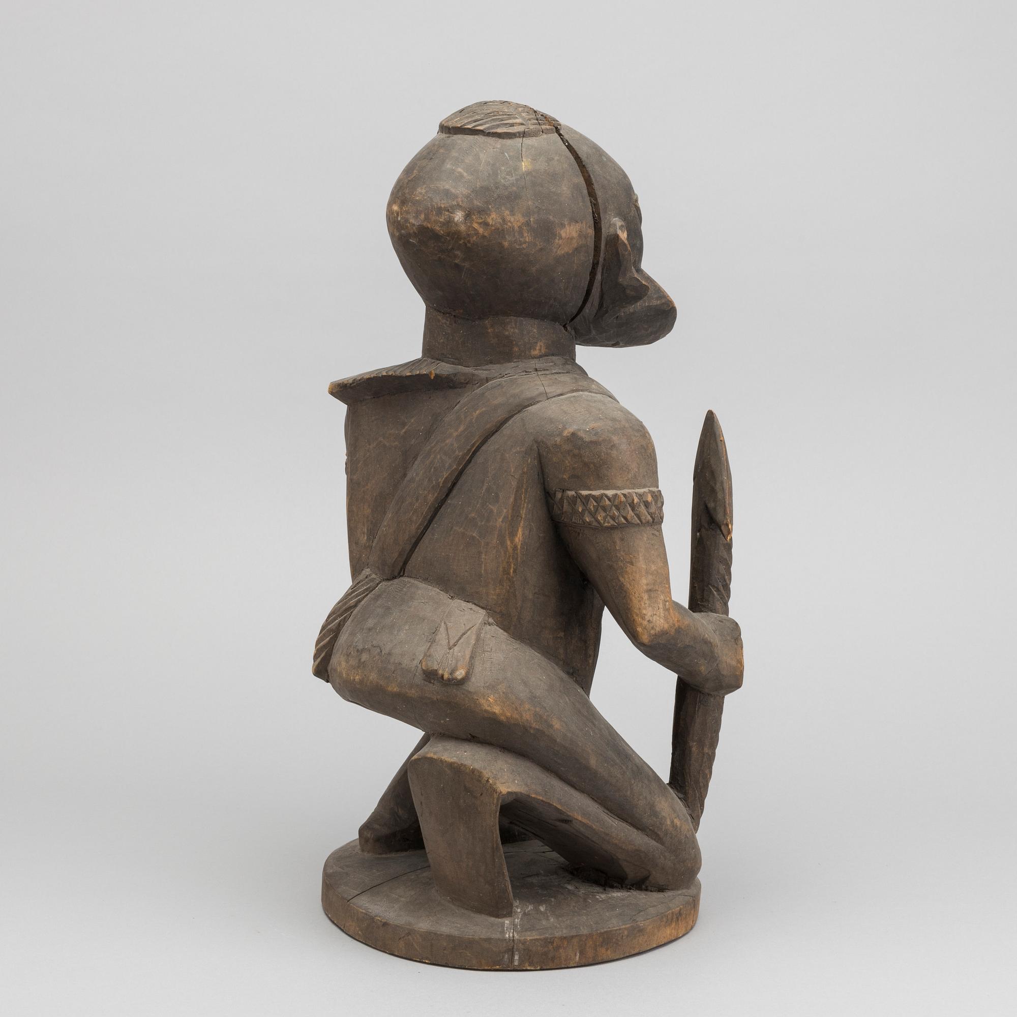 Male warrior figure, Yoruba, Nigeria.