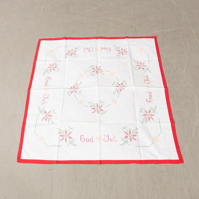 A collection of Christmas tablecloths 12 pcs first half/mid 20th century.