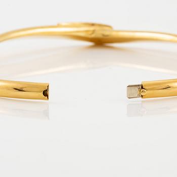 A necklace in 18K gold with round brilliant-cut diamonds.