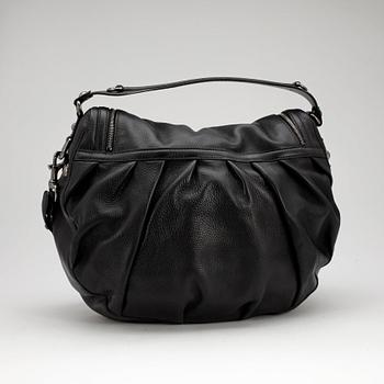 GUCCI, a black leather shoulder bag, "Icon Bit".