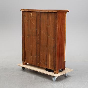 An early 20th century empire-style bookcase.