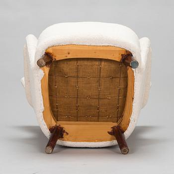 A mid-20th-century armchair.