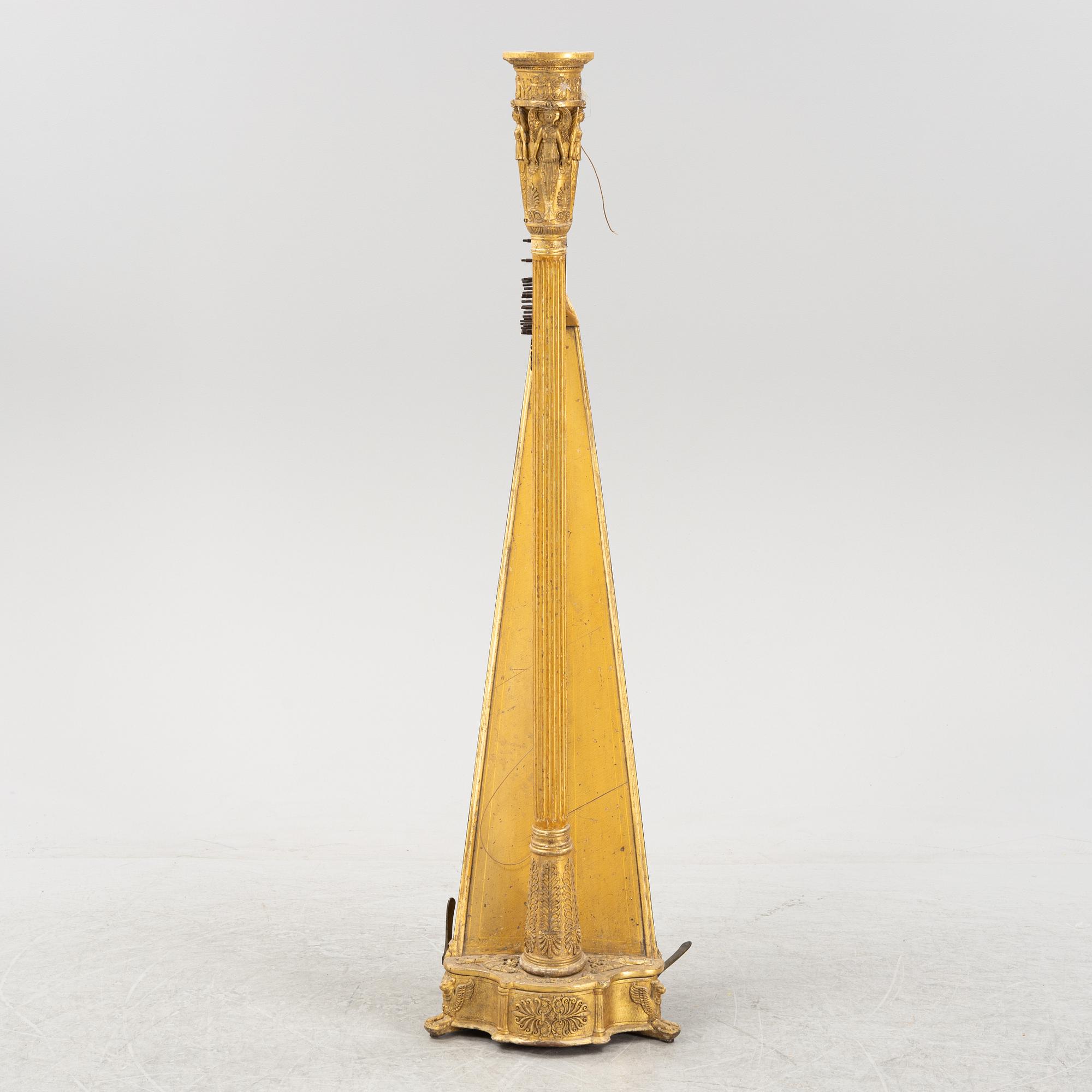 A pedal harp by Jacob & James Erat, London, No 1610, probably made between 1825-1830.