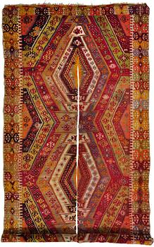 An Antique divided Anatolia kilim with similar patterns ca 433 x 185 cm