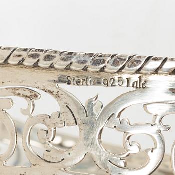 Bowl, basket, and cream jug, silver, 20th century.