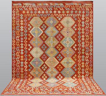 A kilim carpet, ca 292 x 213 cm.