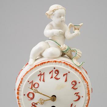 A porcelain mantle clock from Dressel, Kister & Co, Passau, Germany, first half of the 20th Century.