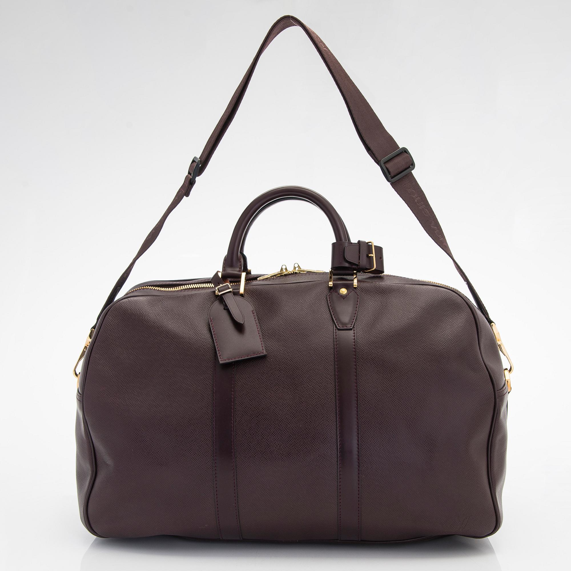 Louis Vuitton, a 'Taiga Kendall PM' weekend bag.