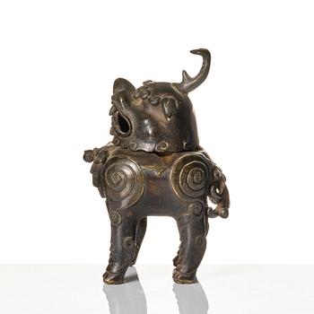 A bronze censer in the shape of a buddhist lion, Ming dynasty (1368-1644).