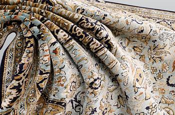 A carpet, silk Qum, ca 203 x 134 cm.