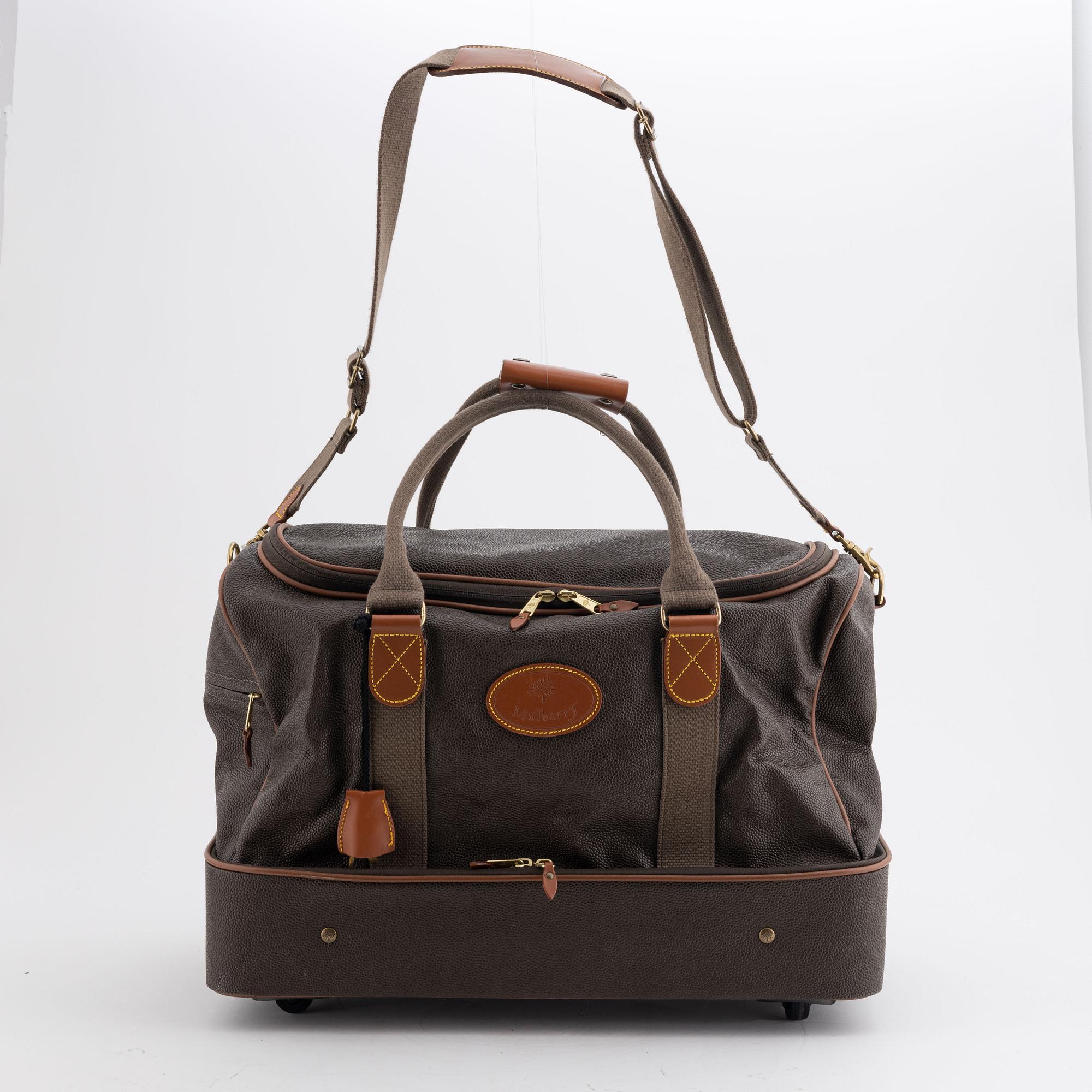 Mulberry, a scotch grain weekend bag.
