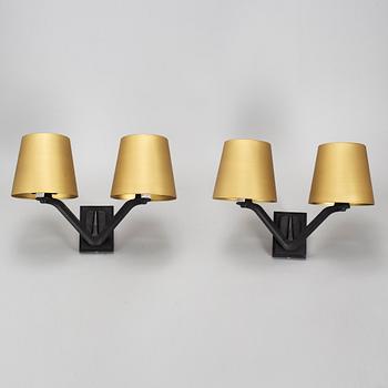 TOM DIXON, a pair of Base wall lights.