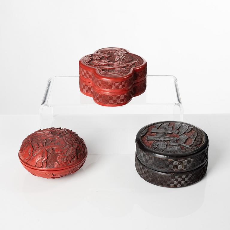 A group of three Chinese lacquer boxes with covers, late Qing dynasty.