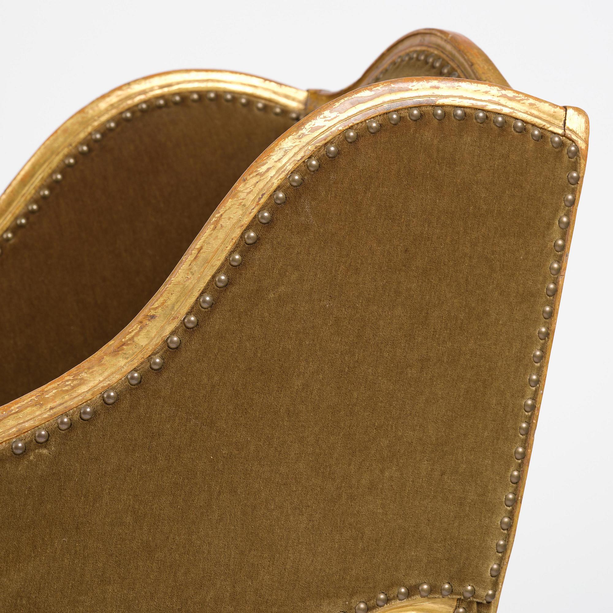 A French Louis Xv giltwood lit de repos, later part 18th century.