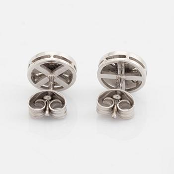 Brilliant and baguette cut diamond earrings.