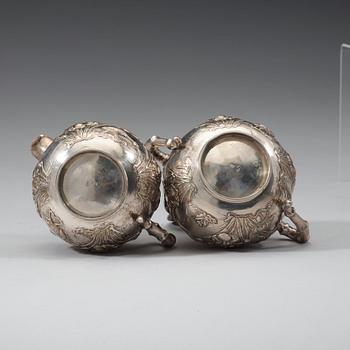 A three piece export silver tea service, Shanghai, early 20th Century.