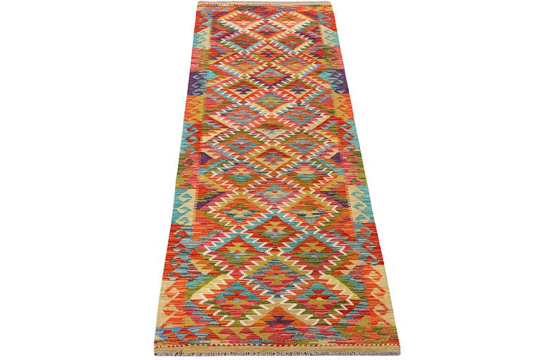 A Kilim runner carpet, c. 300 x 85 cm.