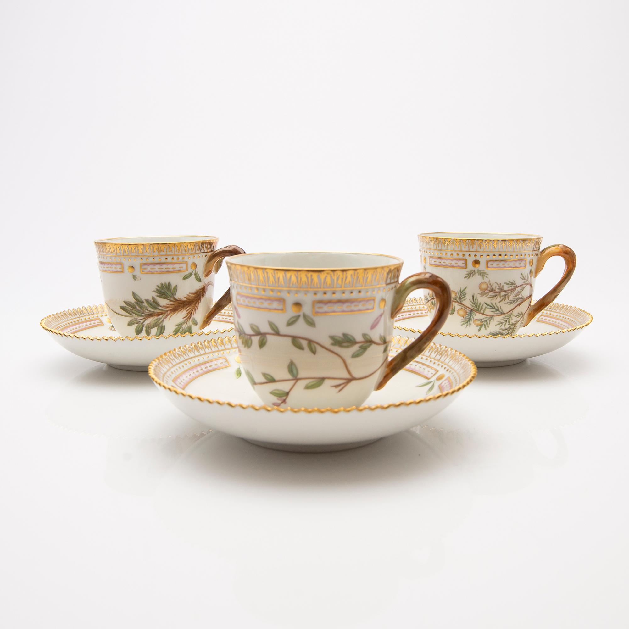 Royal Copenhagen, Coffee cups with saucers, three pieces, porcelain, 'Flora Danica', Royal Copenhagen, Denmark, 20th century.