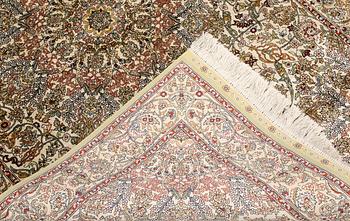 An Oriental silk rug, approx. 153 x 95 cm.