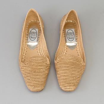 A pair of raffia shoes by Emma Hope's.