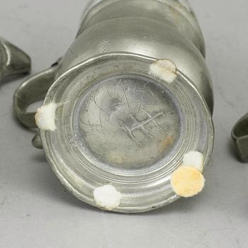 Eight pewter mustard pots, 18th/19th century.