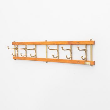 Klädhängare, "Dekorativ", Skoglunds metallgjuteri, Anderstorp, 1950/60-tal.